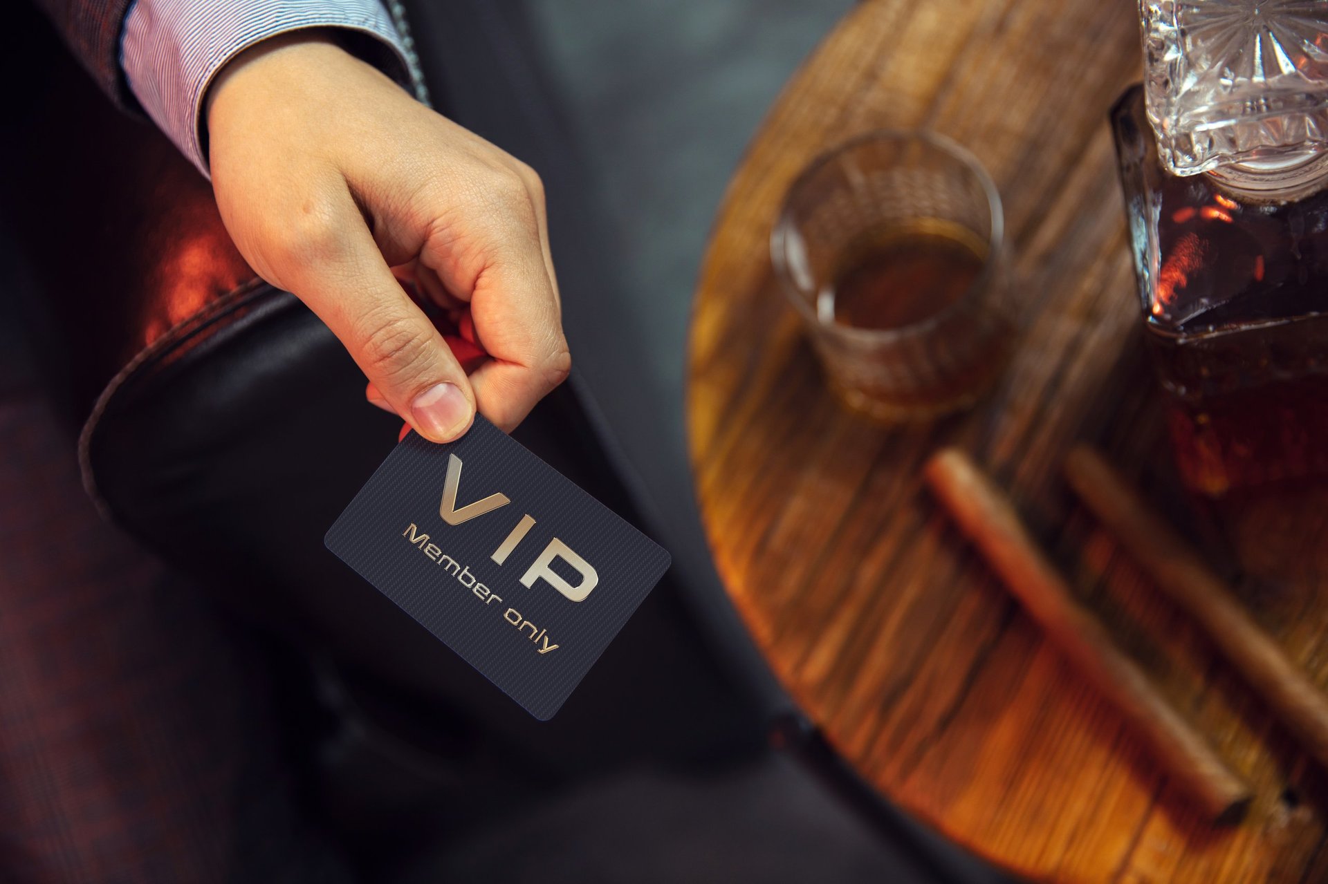 VIP membership card held by traveler at luxury Caribbean resort